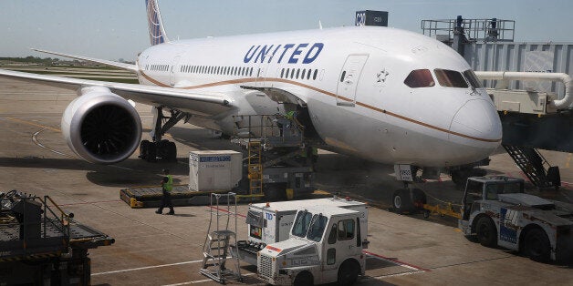 CHICAGO, IL - MAY 20: A United Airlines Boeing 787 Dreamliner is prepared for a flight at O'Hare International Airport after