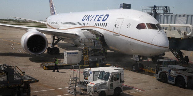 CHICAGO, IL - MAY 20: A United Airlines Boeing 787 Dreamliner is prepared for a flight at O'Hare International Airport after it arrived from Houston with United CEO Jeff Smisek, Boeing Company CEO Jim McNerney and more than 250 other passengers on board May 20, 2013 in Chicago, Illinois. The flight was the first passenger flight for the Boeing Dreamliner since it was grounded for electrical problems in January. (Photo by Scott Olson/Getty Images)