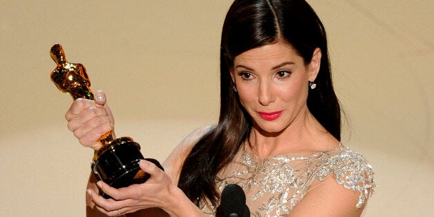 Sandra Bullock accepts the Oscar for best performance by an actress in a leading role for âThe Blind Sideâ at the 82nd Ac