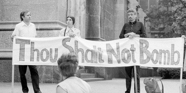 File-This July 25, 1973, file photo shows Rev. Fr. Daniel Berrigan and some friends participating in a fast and vigil to protest the bombing in Cambodia, on the steps of St. Patrickâs Cathedral in New York City. The Roman Catholic priest and Vietnam war protester, Berrigan has died. He was 94. Michael Benigno, a spokesman for the Jesuits USA Northeast Province, says Berrigan died Saturday, April 30, 2016, at a Jesuit infirmary at Fordham University. (AP Photo/Ron Frehm)