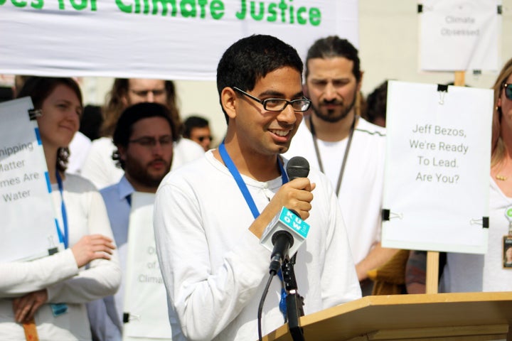 Rajit Iftikhar addresses supporters and the press at an employee rally.