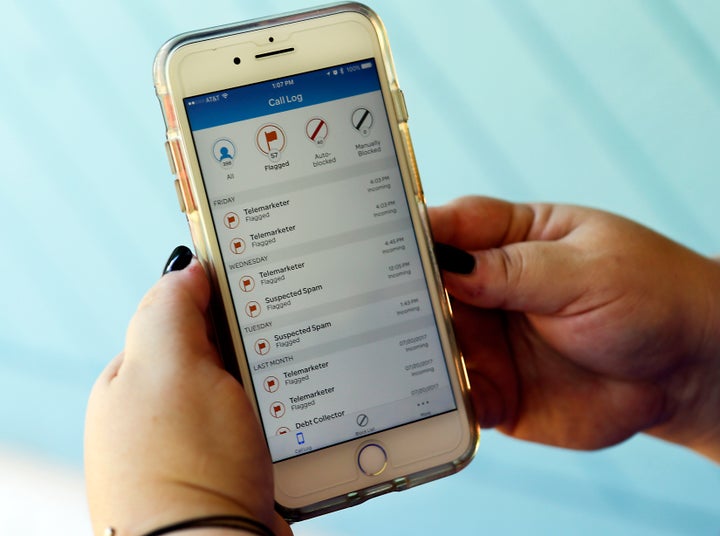 A call log is seen displayed via an AT&T app that helps locate and block fraudulent calls, although some robocalls do get
