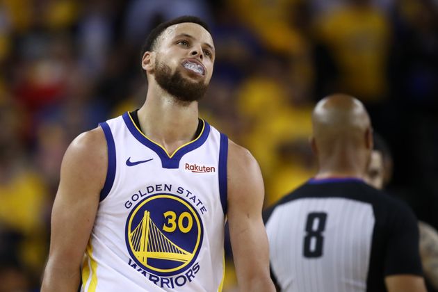Golden Star Warriors player Steph Curry pictured chewing on his mouth guard during Game 3 of the 2019 NBA Finals.