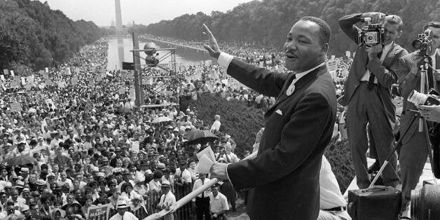 WASHINGTON, UNITED STATES: (FILES) US civil rights leader Martin Luther King, Jr., waves to supporters from the steps of the