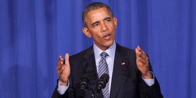 WASHINGTON, DC - NOVEMBER 9: U.S. President Barack Obama makes remarks at an Organizing for Action dinner on November 9, 2015 in Washington, DC. Organizing for Action is a community organizing project that supports the policies of President Obama. (Photo by Chris Kleponis-Pool/Getty Images)