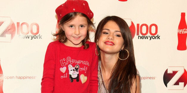 Selena Gomez (R) and a guest attend Z100 and Coca Cola's All Access Lounge pre-show at Hammerstein Ballroom on December 10, 2