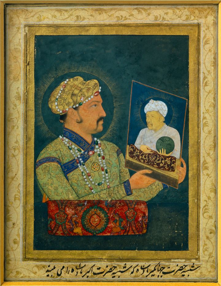 Portrait of Akbar (1542-1605) holding the portrait of his father.
