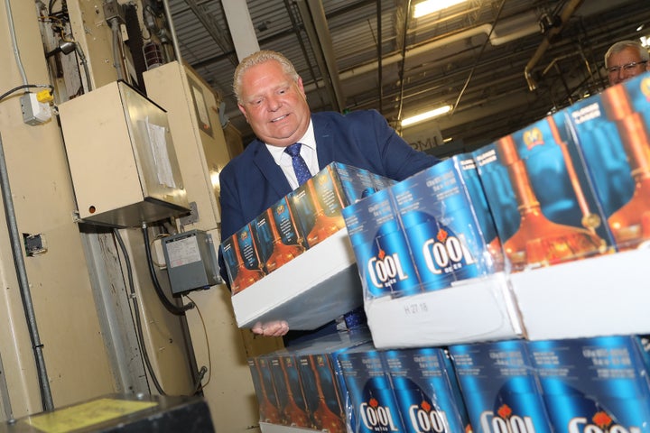 Premier Doug Ford shacks some buck-a-beer beer Aug. 27, 2018 at the Cool Beer Brewing Company in Etobicoke.