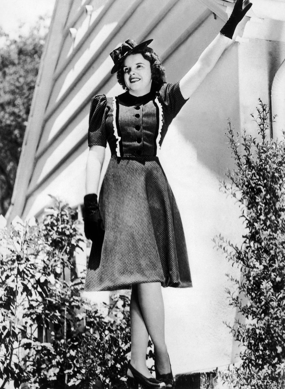 1940. Garland wears a dress she wore in the film "Babes in Arms,"...