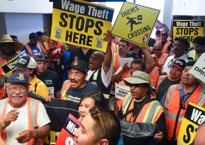 Workers protest wage theft in Orange County, California, in 2017.