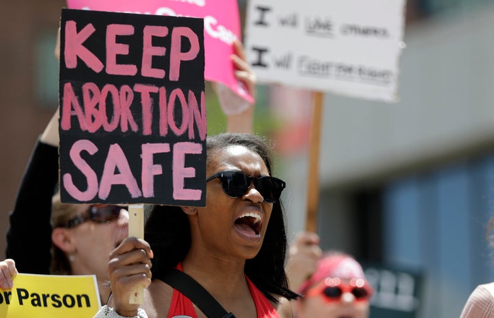 Abortion rights supporters protest in May in St. Louis, Mo. The state is on the verge of losing its only abortion clinic at a time when other states, mostly in the South, are passing laws that severely restrict reproductive rights.