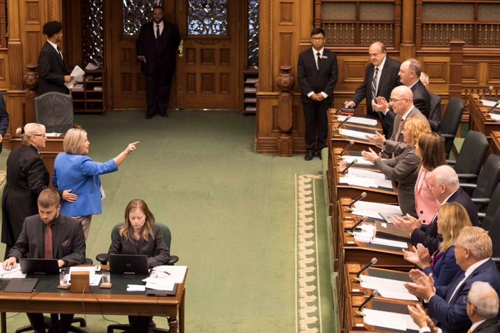 Ontario NDP Leader Andrea Horwath is ejected from the legislature as part of a protest against the government's law that cut the size of Toronto city council on Sept. 12, 2018. 