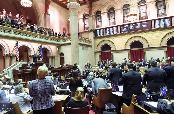 Members of the New York Assembly celebrate after the Child Victims Act passed on Jan. 28, 2019, in Albany.