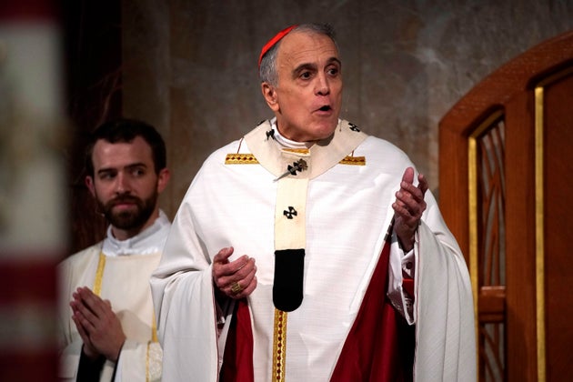 Cardinal Daniel DiNardo presides over a Mass of Ordination for seven candidates for the priesthood at...