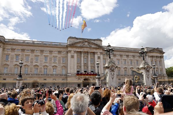 Britain's Red Arrows, the flying display team of the Royal Air Force, fly over Buckingham Palace.