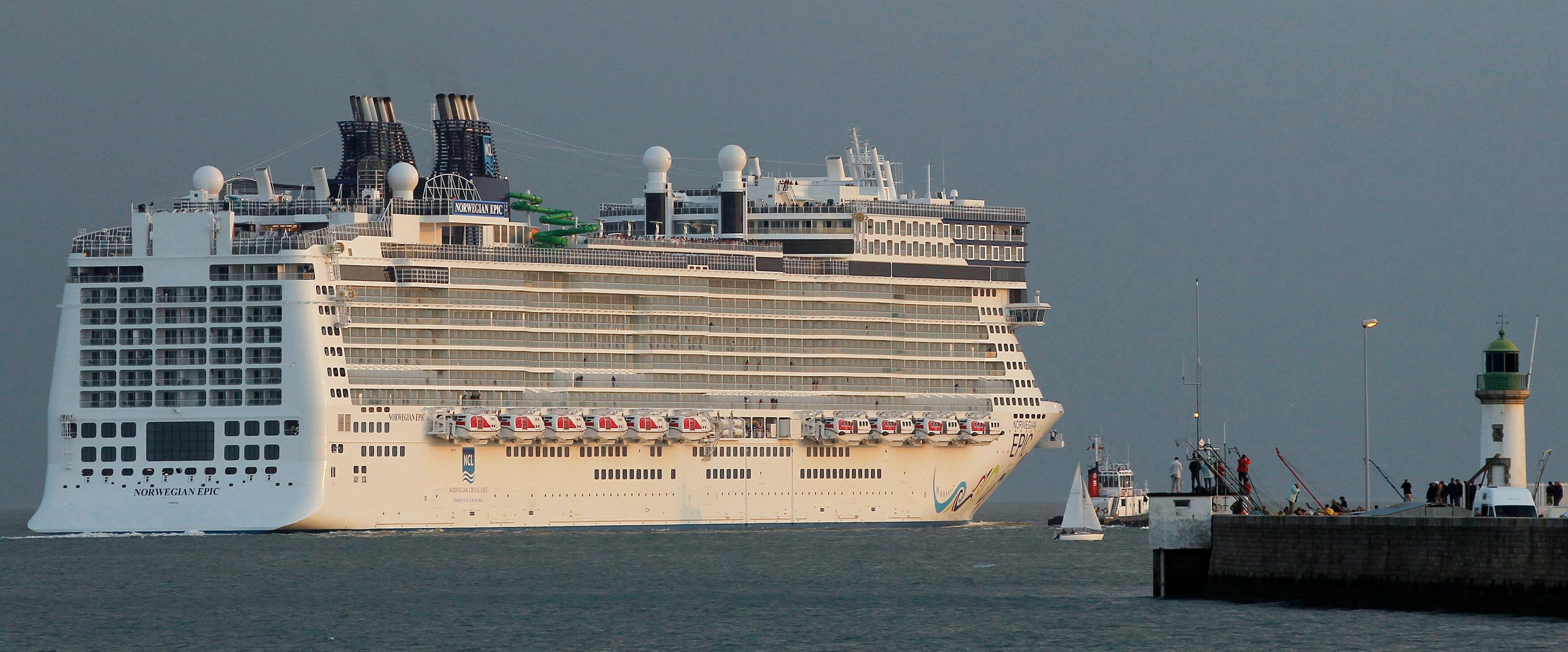 The Norwegian ocean liner "Epic" leaves France?s Atlantic Ocean from the Saint Nazaire naval shipyard, June 17, 2010. The 4,200 passenger liner measures 329 meters, and is the largest cruise ship built to date in France at a cost of approximately $1.2 billion. REUTERS/Stephane Mahe (FRANCE - Tags: TRAVEL BUSINESS SOCIETY)