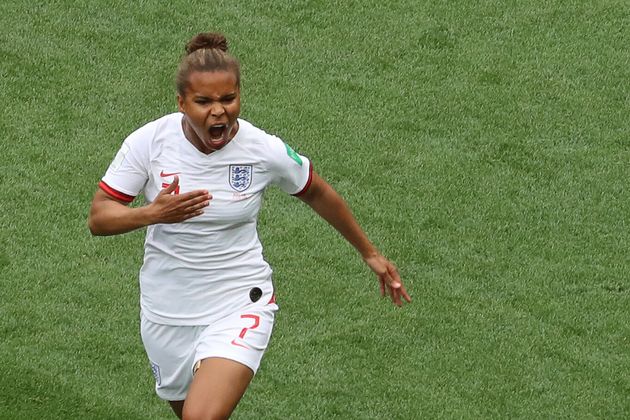 Nikita Parris celebrates after scoring England's first goal.