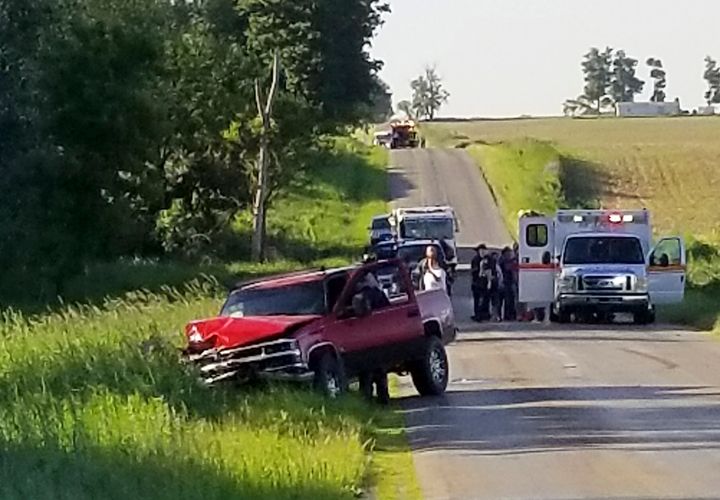 A damaged truck sits on the side of the road after an accident involving a horse-drawn carriage on Friday, June 7, 2019 in California Township, Mich.