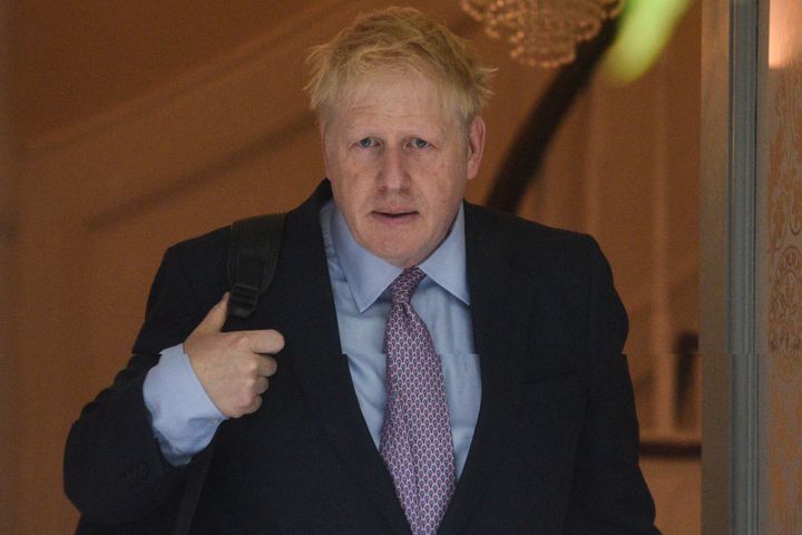  Boris Johnson leaves his girlfriend's home on Monday. 