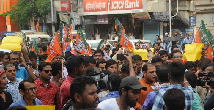 BJP workers take out a protest rally in Kolkata. 