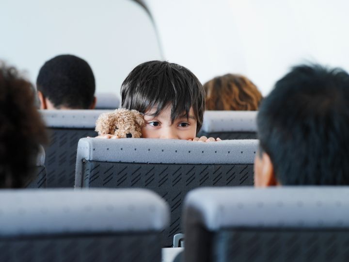 Air Canada's policy is to sit young children together with a parent or guardian at no additional charge.