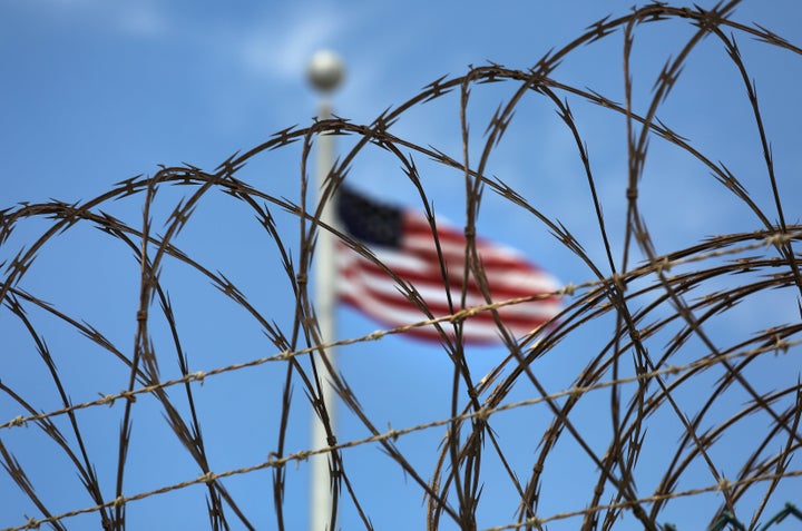 Razor wire tops the fence of the U.S. prison at Guantanamo Bay, also known as "Gitmo" on October 23, 2016 at the U.S. Naval S