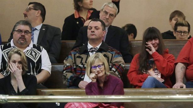 Tim Reynon, second row left, and Lisa Earl, second row right, whose daughter Jacqueline Salyers was killed by police, sit at a January state House hearing in Tacoma, Washington. Reynon, a Puyallup tribal council member, helped unify Washington state tribes around an effort to change police standards. Native Americans are the minority group most likely to be killed by police.