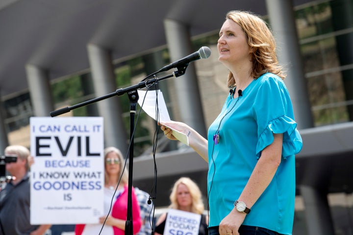 Mary DeMuth, a rape survivor who's an advocate for sexual abuse victims, speaks during a rally at the Southern Baptist Convention meeting in Dallas in 2018.