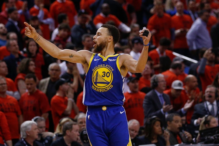 Golden State Warriors guard Stephen Curry celebrates the win at Scotiabank Arena on June 11, 2019.