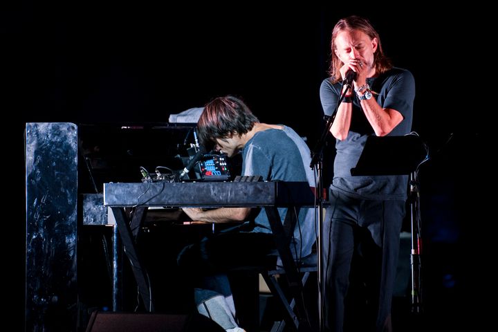 Thom Yorke and Jonny Greenwood (on piano) of the group Radiohead perform onstage on Aug. 20, 2017, in Macerata, Italy.