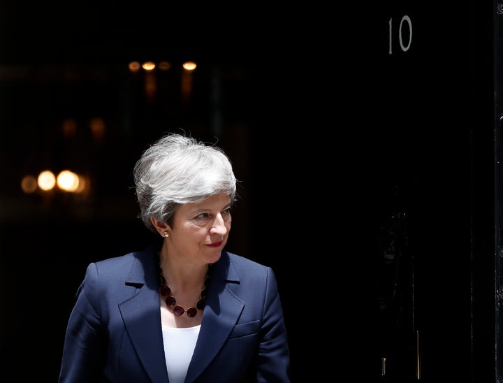 “Standing by is not an option," May said late Tuesday. "Reaching net zero by 2050 is an ambitious target, but it is cru
