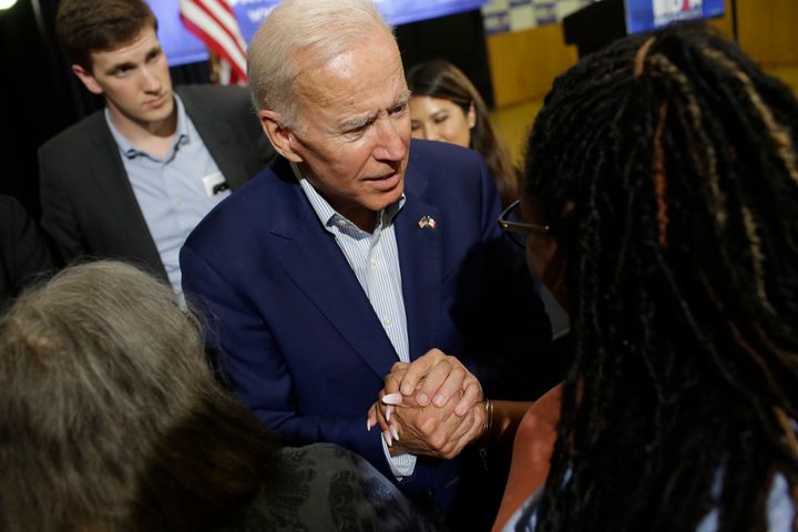 Joe Biden greets an attendee during a campaign event Tuesday in Davenport, Iowa. 