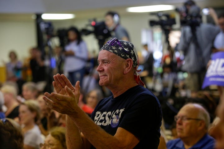 Former Vice President Joe Biden draws applause during a presidential campaign event Tuesday in Davenport, Iowa.