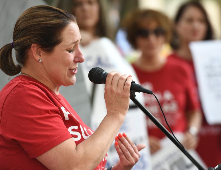Jules Woodson, of Colorado Springs, Colo., speaks during a rally outside the Southern Baptist Convention's annual meeting Tuesday, June 11, 2019, in Birmingham, Ala. 