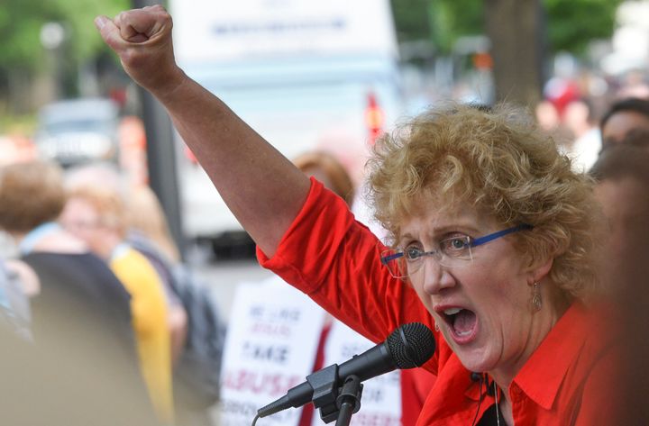 Christa Brown, of Denver, Colo., speaks outside the Southern Baptist Convention's annual meeting Tuesday, June 11, 2019, during a rally in Birmingham, Ala.