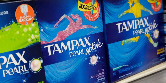 Boxes of tampons are displayed in a pharmacy, Monday, March 7, 2016, in New York. A group of women has filed a lawsuit accusing New York of unlawfully taxing tampons and other feminine hygiene products. The suit argues that medical items are exempt from sales tax in New York. (AP Photo/Mark Lennihan)