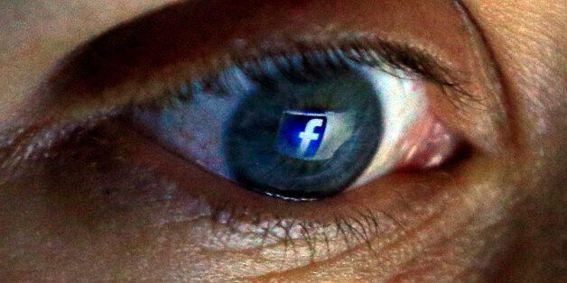 PICTURE POSED BY MODEL File photo dated 27/08/15 of the Facebook logo seen reflected in a person's eye, as the social network's revenues have jumped to 4.5 billion dollars (£2.92 billion) as its number of global users grew to a record 1.55 billion.