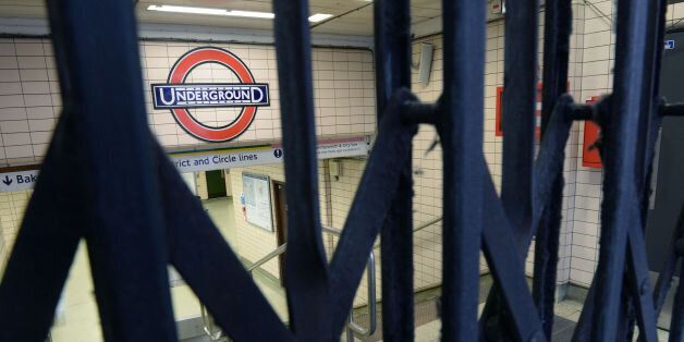 File photo dated 05/08/15 of an Underground sign seen through closed gates at Paddington Underground station, London, as Train drivers on London Underground look set to take three days of strike action over a long-running dispute about pay and plans for an all night Tube service.