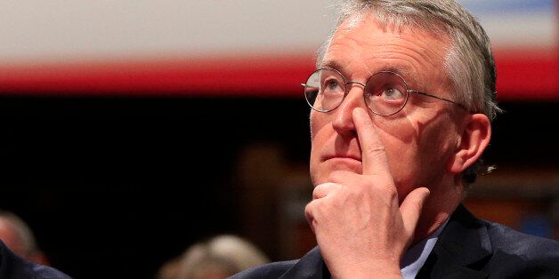 Shadow foreign secretary Hilary Benn watches a debate on the final day of the Labour Party annual conference at the Brighton Centre in Brighton, Sussex.