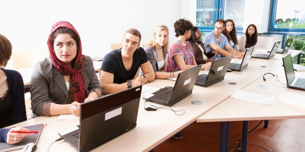 The chief inspector of schools in England will support schools and colleges that 'take a stand against the inappropriate wearing of the veil' (picture posed by models)