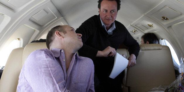 Leader of the Conservative party David Cameron (right) and his aide Steve Hilton (left) during their visit to the Arctic, April 2006.