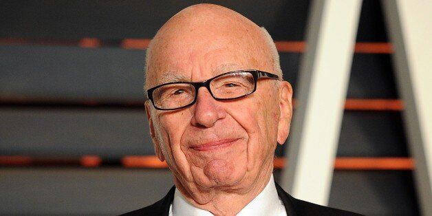 FILE - In this Feb. 22, 2015 file photo, Rupert Murdoch arrives at the 2015 Vanity Fair Oscar Party in Beverly Hills, Calif. Murdoch, issued an apology Thursday, Oct. 8, after he faced social media backlash following his suggestion that President Barack Obama isn't a
