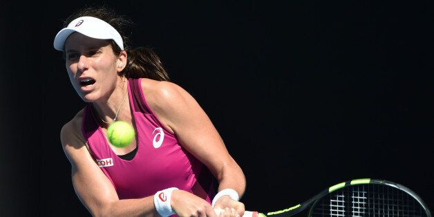 Britain's Johanna Konta plays a backhand return during her women's singles semi-final match against Germany's Angelique Kerber on day eleven of the 2016 Australian Open tennis tournament in Melbourne on January 28, 2016. AFP PHOTO / SAEED KHAN-- IMAGE RESTRICTED TO EDITORIAL USE - STRICTLY NO COMMERCIAL USE / AFP / SAEED KHAN (Photo credit should read SAEED KHAN/AFP/Getty Images)