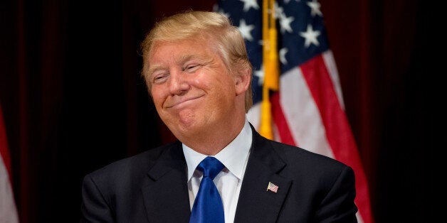 Republican presidential candidate Donald Trump smiles while speaking at a rally at Drake University in Des Moines, Iowa, Thursday, Jan. 28, 2016. (AP Photo/Andrew Harnik)