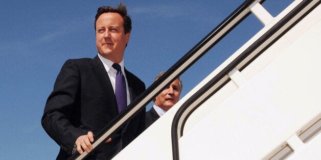 File photo dated 24/06/10 of Prime Minister David Cameron boarding a plane bound for Canada, as Mr Cameron and other senior ministers are to get a dedicated aircraft to take them on official visits around the world.