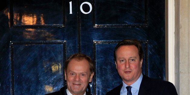 Prime Minister David Cameron (right) greets European Council president Donald Tusk at 10 Downing Street in London ahead of crunch talks to finalise an EU reform package that could be backed by the rest of the 28-country bloc.