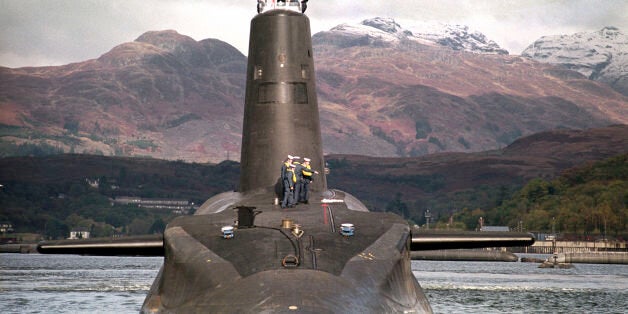 Embargoed to 0001 Sunday January 3File photo dated 30/01/02 of the Royal Navy's 16,000 ton Trident-class nuclear submarine Vanguard. Costs for the "immoral and obscene" replacement for the Trident nuclear missile submarines have already reached almost £5 billion before Parliament has voted to give the project the final go-ahead, the SNP said.