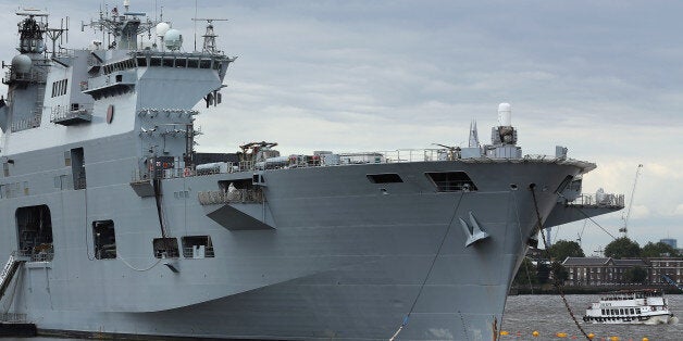 HMS Ocean, the Royal Navy's largest ship, moored on the River Thames outside Greenwich where it stayed during the 2012 Olympic games