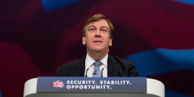 John Whittingdale, Secretary of State for Culture, Media and Sport speaks during the Conservative Party Conference, in Manchester, England, Monday Oct. 5, 2015. The ruling Conservative Party continue their annual conference on Monday, seemingly buoyant after their electoral triumph in May. (AP Photo/Jon Super)