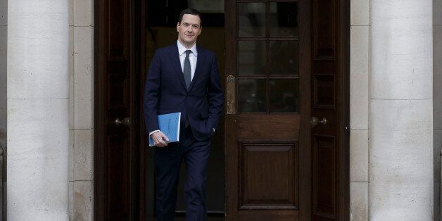 Britain's Chancellor of the Exchequer George Osborne leaves the Treasury for the House of Commons to deliver the his Autumn statement, in London, Wednesday Nov. 25, 2015. (AP Photo/Tim Ireland, Pool)